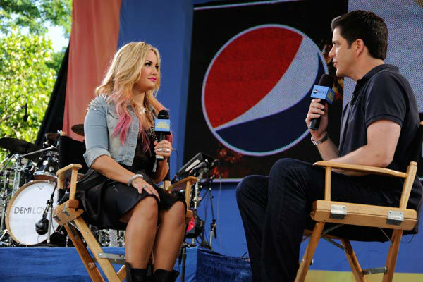 Demi Lovato talks to Josh Elliot during her live...