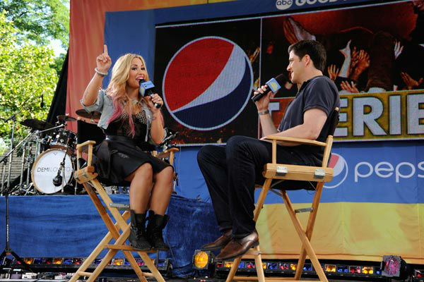 Demi Lovato talks to Josh Elliot during her live...