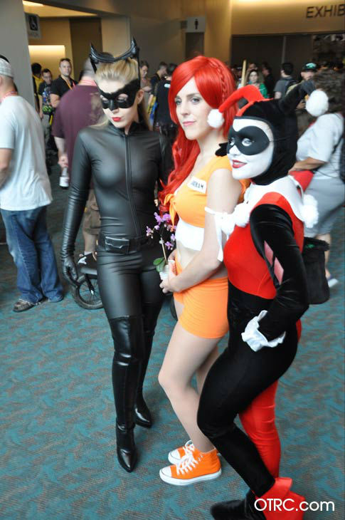 Fans dressed as Catwoman, Poison Ivy and Harley...