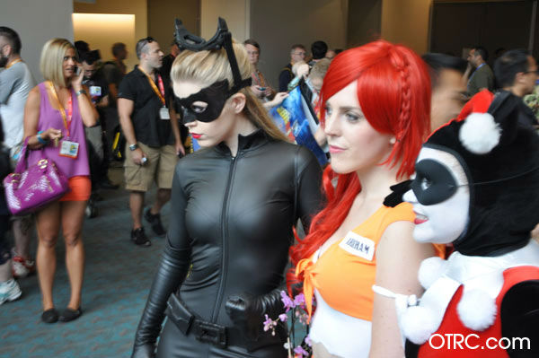 Fans dressed as Catwoman, Poison Ivy and Harley...