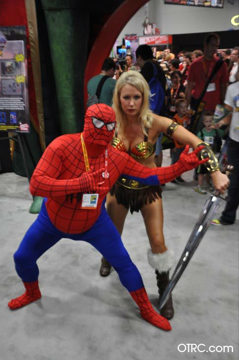 Fans dressed in costumes appear in a photo at...