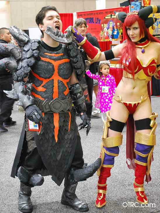 Fans dressed in costumes appear in a photo at...