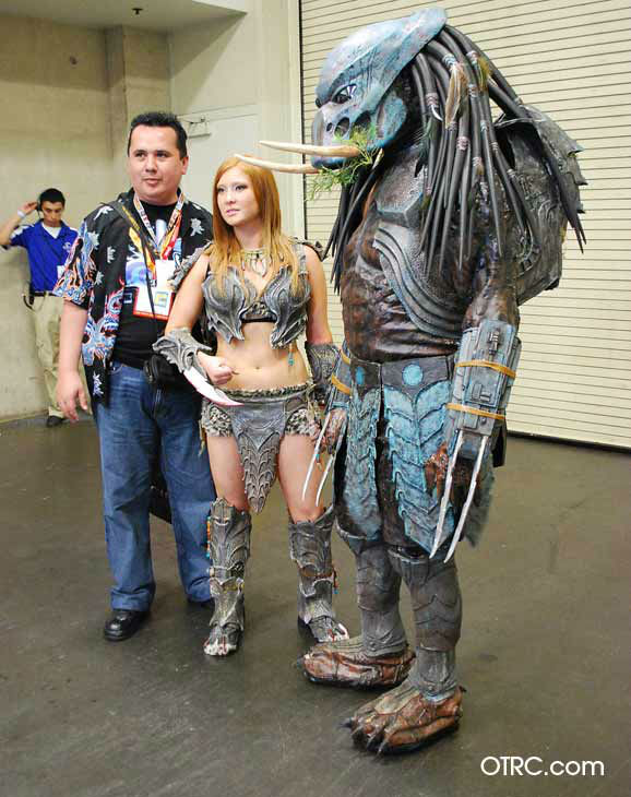 Fans dressed in costumes appear in a photo at...