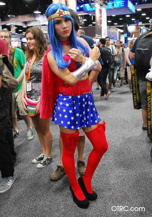 A fan dressed as Wonderwoman appears in a photo...