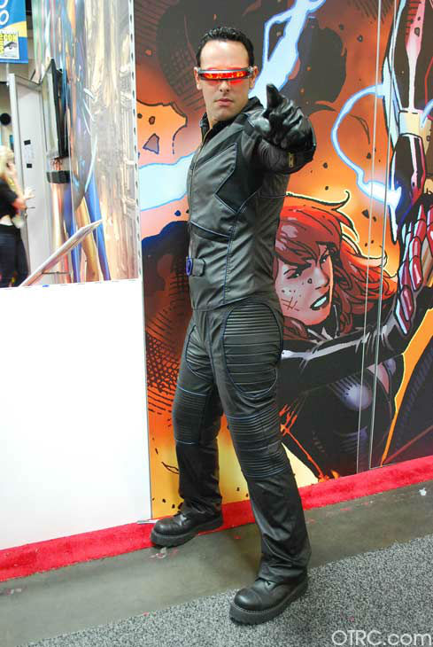 A fan dressed as Cyclops of 'X-Men' appears in a...