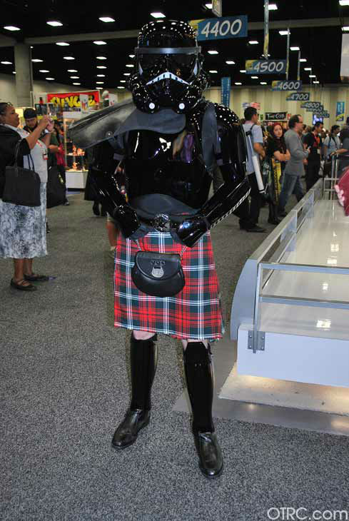 A fan dressed in costume appears in a photo at...