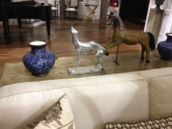 Pictured is a couch and living room setting...