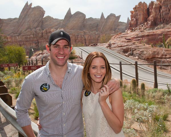 Actors Emily Blunt and John Krasinski pose at...