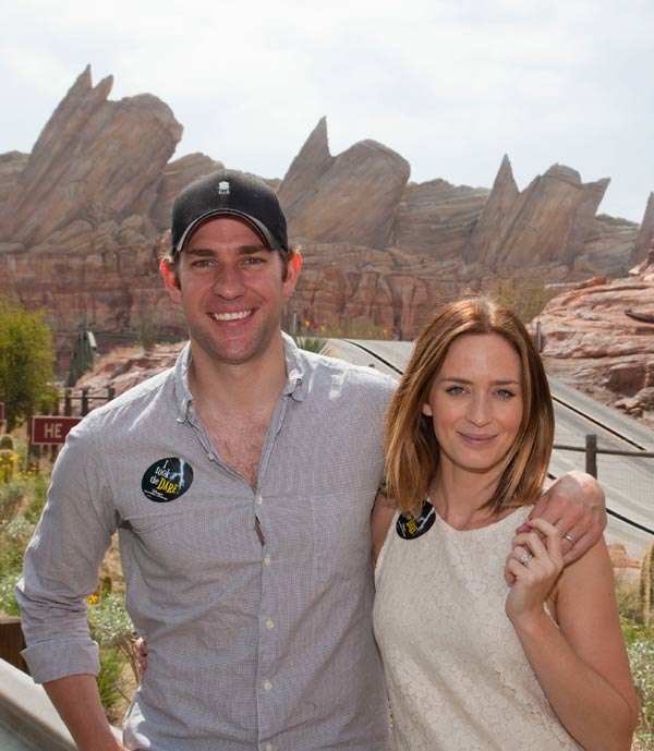 Actors Emily Blunt and John Krasinski pose at...