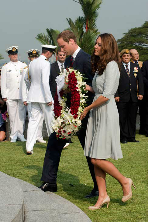 Britain's Prince William and his wife Kate, the...