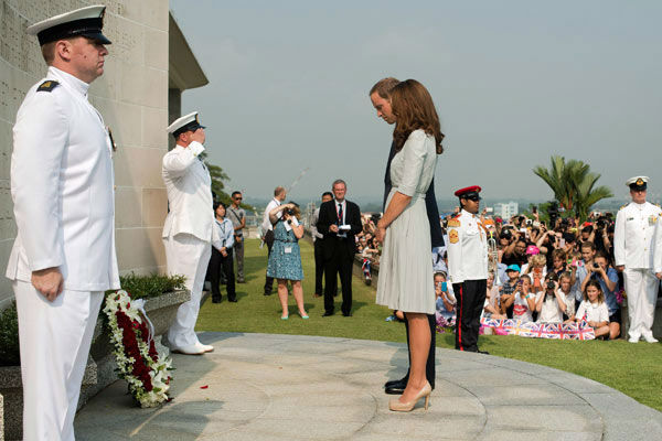 Britain's Prince William and his wife Kate, the...