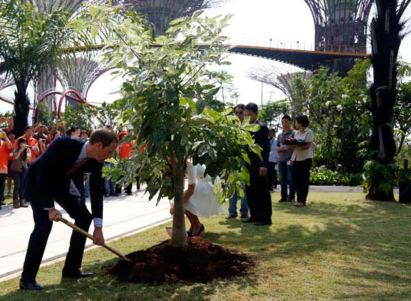 Britain's Prince William, left, and his wife...