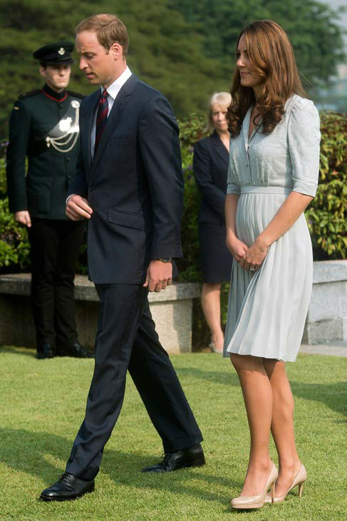 Britain's Prince William and his wife Kate, the...