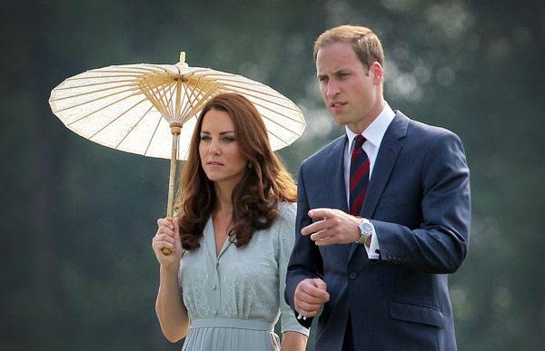 Britain's Prince William and his wife Kate, the...