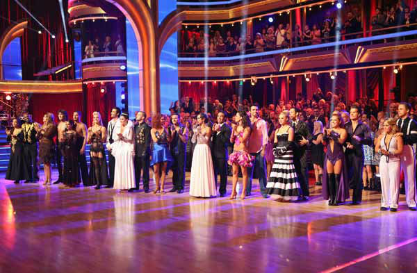 The cast appears in a still from 'Dancing With...