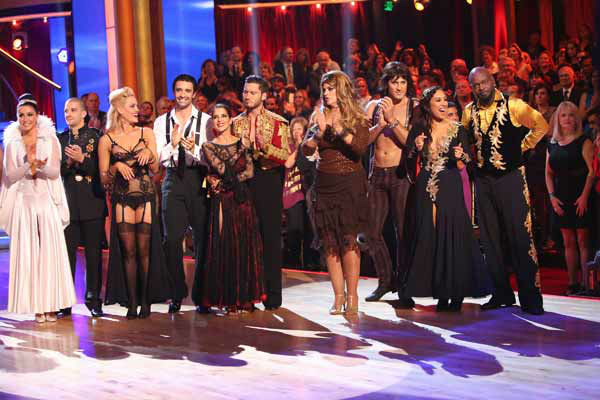 The cast appears in a still from 'Dancing With...