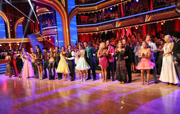 The cast appears in a still from 'Dancing With...