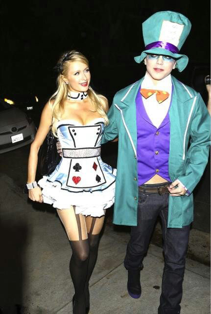 Paris Hilton and male model River Viiperi appears in a photo posted on Hilton's official Twitter page on October 27, 2012. The pair are dressed as Alice and the Mad Hatter from 'Alice in Wonderland.'