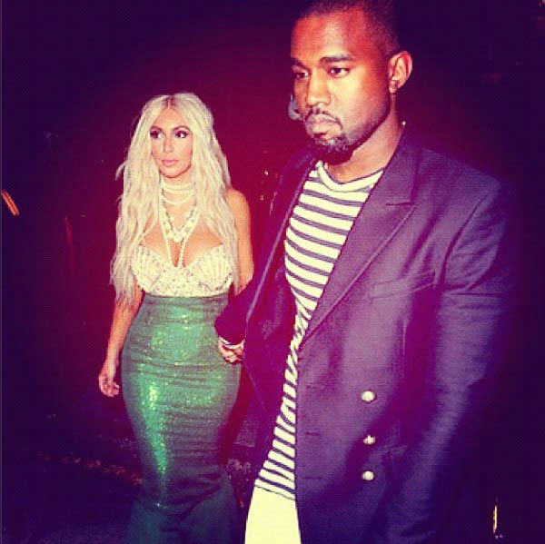 Kim Kardashian and Kanye West appear in a photo...