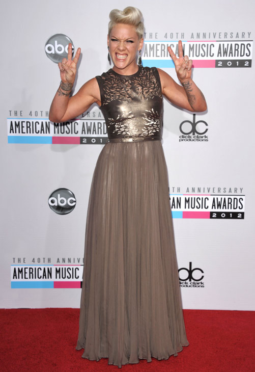 Pink arrives at the 40th Anniversary American Music Awards on Sunday, Nov. 18, 2012, in Los Angeles.