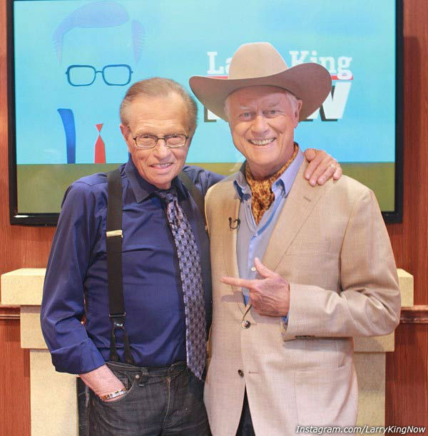 Larry King appears with Larry Hagman in an...
