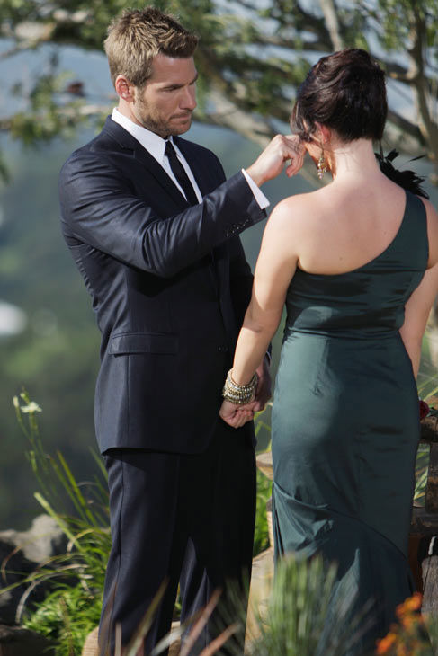 Brad Womack wipes away tear after breaking the...
