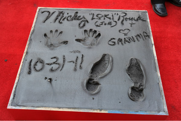 Actor Mickey Rourke is immortalized at his Hand...