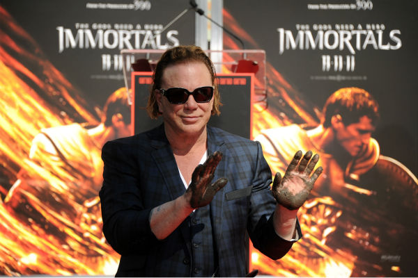 Actor Mickey Rourke is immortalized at his Hand...