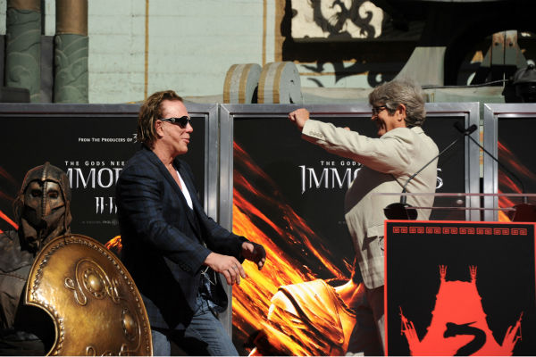 Actors Mickey Rourke and Eric Roberts onstage at...