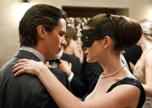 Christian Bale appears as Batman and Anne...