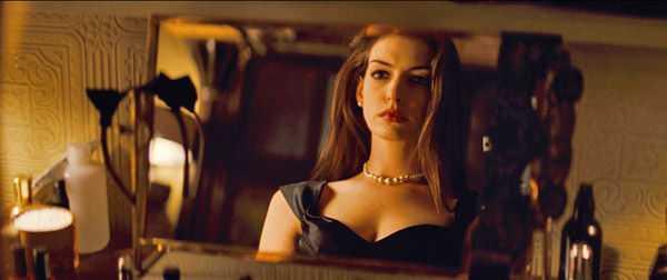 Anne Hathaway appears as Selina Kyle/Catwoman in...