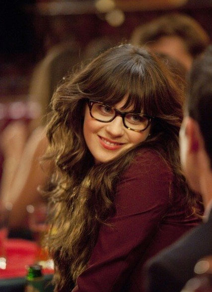 Zooey Deschanel appears in a promotional photo...