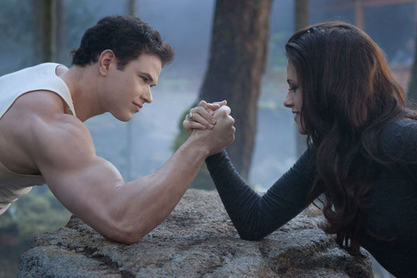 Kellan Lutz and Kristen Stewart appear in a...
