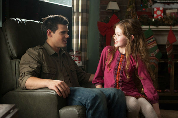 Taylor Lautner and Mackenzie Foy appear in a...