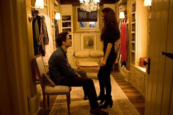 Kristen Stewart and Robert Pattinson appear in a...