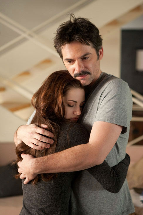 Kristen Stewart and Billy Burke appear in a...