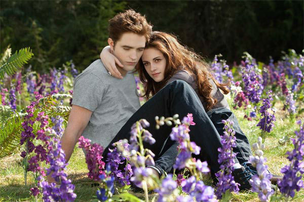 Kristen Stewart and Robert Pattinson appear in a...