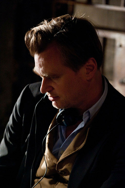 Director Christopher Nolan appears on the set of...