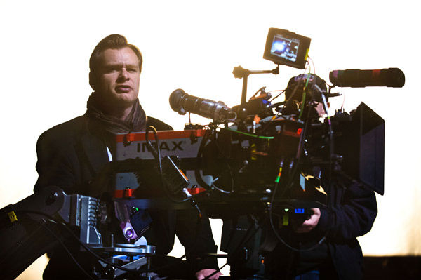 Director Christopher Nolan appears on the set of...