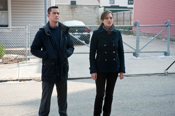 Joseph Gordon Levitt appears as John Blake and...