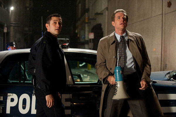 Joseph Gordon Levitt appears as John Blake and...
