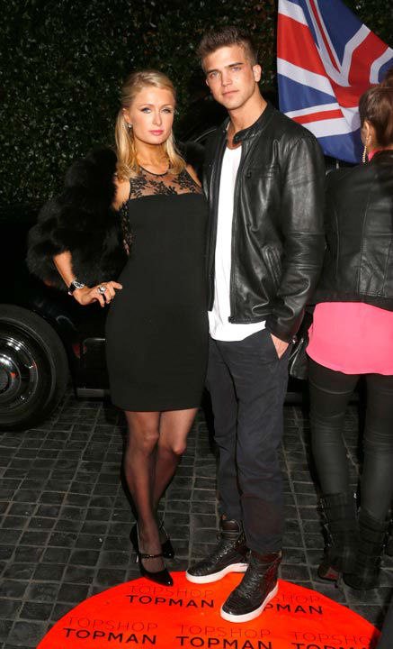 Paris Hilton and River Viiperi attend the...