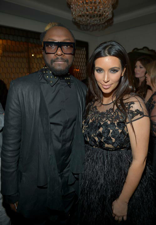Singer Will.i.am and Kim Kardashian attend the...