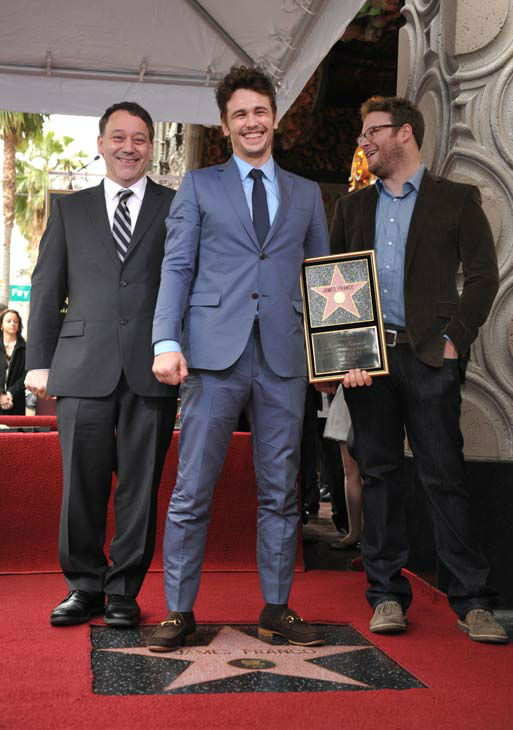 Director Sam Raimi, left, actor James Franco,...