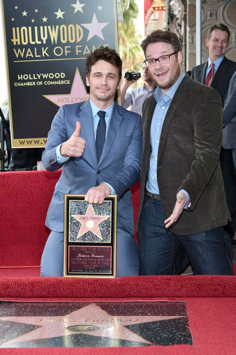 Actors James Franco (L) and Seth Rogen attend a...