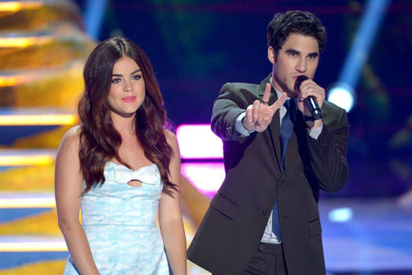 Hosts Lucy Hale, left, and Darren Criss speak on...