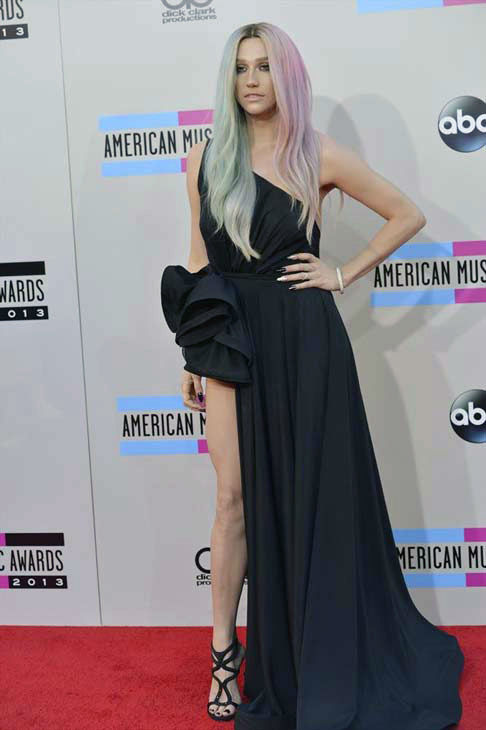 Ke$ha arrives at the American Music Awards at the Nokia Theatre L.A. Live on Sunday, Nov. 24, 2013, in Los Angeles.