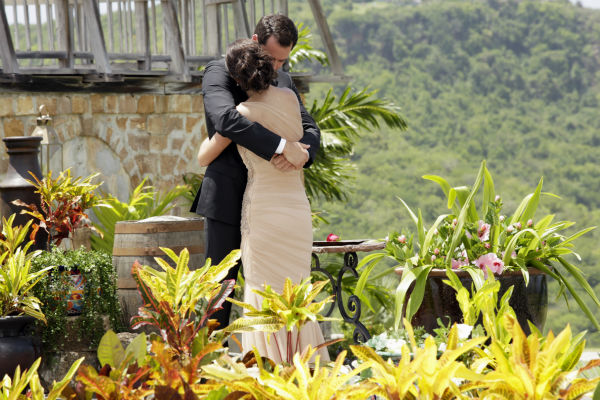 Desiree Hartsock and Chris Siegfried hug on the...