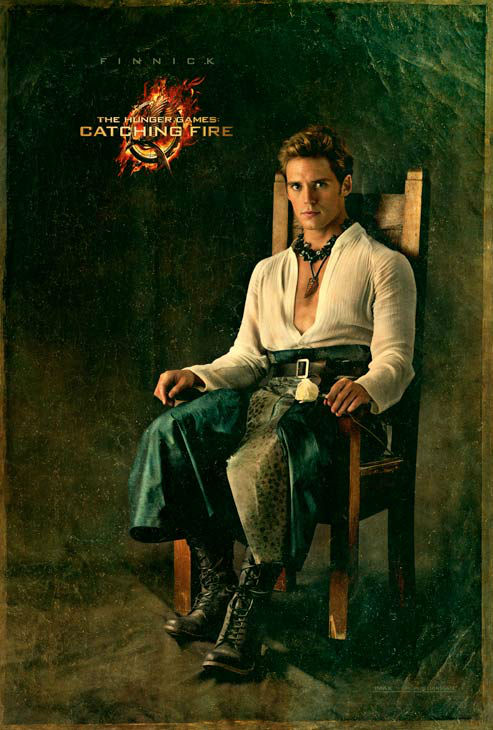 Sam Claflin poses as Finnick Odair in 'The...