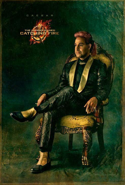 Stanley Tucci poses as Caesar Flickerman in 'The...